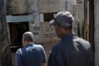 West Bank mosque set ablaze amid surge in Israeli settler violence
