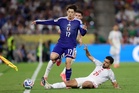 Japan stroll to victory over Tunisia in World Cup's 1,000th game