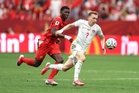 Switzerland spoil Canada’s party but co-hosts march into last 32 for first time