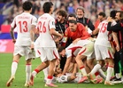 Turkiye stun rotated US side with late winner in World Cup warning shot