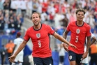Kane, Bellingham shine as England win World Cup group