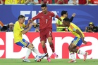 Colombia and Portugal through to World Cup last 32 after thrilling draw