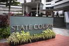 Singapore man pleads guilty to abusing primary school students, forced boy to drink urine