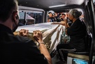 Families claim bodies as Bangkok fire toll rises to 30