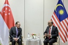 Singapore and Malaysia seek deeper collaboration as Anwar and Tharman discuss regional challenges