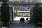 Singapore lawyer charged over alleged forgery in S$3b money laundering property deal