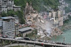 Mountain roars down in deadly Chongqing landslide, eight killed, scores trapped