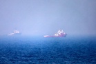 Vessel on fire in Strait of Hormuz as US and Iran vie for control