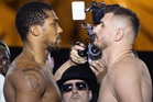 ‘I can’t be stopped’: Anthony Joshua fights back from two knockdowns to tee up Fury clash