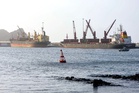 Iran and Oman report progress in Hormuz talks after US strikes paused for negotiations