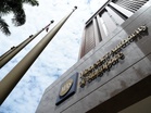 Singapore central bank defies market expectations with surprise policy tightening