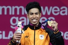 Glasgow 2026: Malaysia’s Muhamad Aznil completes golden hat‑trick at Glasgow 2026, sets three Games records