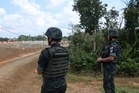 Six held, RM2.98m worth of iron ore and equipment seized in Kelantan mining raid