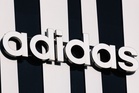 Adidas shares plunge 17pc as World Cup marketing costs hammer quarterly profit