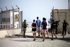 In Spain’s Ceuta, exhausted migrants end short stay with little hope, return across border