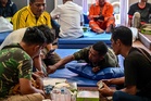 Survivors recall blasts before deadly Indonesian ferry fire