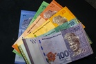Ringgit ends lower against dollar, major currencies as US Treasury yields rise