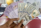 Ringgit edges up as weak US economic data weighs on dollar