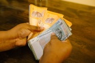 Ringgit edges higher at market open, but Hormuz tensions keep gains in check