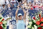 Swiatek storms past Rybakina to claim first title of year in Toronto