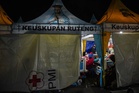 Indonesia rushes aid to Flores as quake death toll rises to 47