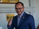 Company MD says he handed Hamzah Zainudin’s former aide RM350,000 cash in paper bags after firm won police tender