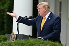 Trump vows to double tariffs on Canadian vehicles to 50pc as trade war deepens