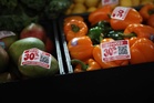 Wall Street slips as stubborn inflation keeps Fed outlook in focus