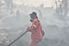 Malaysia, Indonesia step up haze response with weather modification plans
