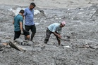Nepal begins burials as flood death toll rises to 752