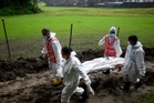 With morgues full, Nepal families give DNA in search for loved ones missing after deadly floods