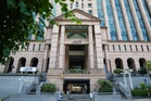 Bursa Malaysia ends higher on bargain hunting ahead of Bank Negara rate decision