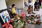 Nepal holds day of mourning as families pray missing still alive