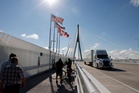 Trump bans Canadian alcohol and targets wider range of goods in escalating trade war