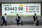 Asian stocks rise as Wall Street gains and falling oil ease inflation worries