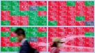 Global stocks fall as bond yields surge, oil rises sharply