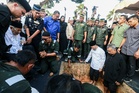 After 70 years together, Dr Mahathir weeps as Dr Hasmah laid to rest