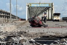 Myanmar market airstrike death toll hits 50, aid workers say