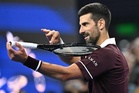 Djokovic defies age and recent fitness woes to send Zverev crashing out in Beijing