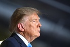 Trump reverses course, will pay for self-promoting political ads