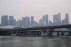 Singapore gears up for Grand Prix under a cloud of haze