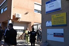 Police: French school headmaster shot; teenager held