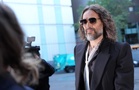 ‘He became monster-like’: Russell Brand rape accuser tells court she was ‘terrified’ in hotel room