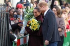 Back like they never left? Harry and Meghan receive royal-style welcome on first joint outing since UK return