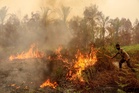 Four killed in Indonesia battling fires causing toxic haze