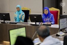 Queen calls for long-term measures to protect students from haze