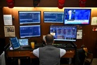 Wall Street rises as oil retreats, but AI jitters keep tech stocks in check