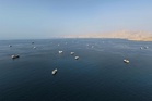 Iran says naval mines hit three tankers in Strait of Hormuz