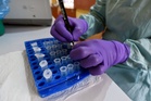 WHO says first Ebola vaccine shots given in DR Congo trial as cases pass 9,700