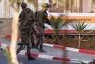 On his way to cover an olive harvest, AFP photographer ends up capturing a deadly attack